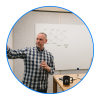 Man pointing to whiteboard