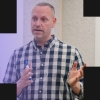 Danny speaking to peers about security