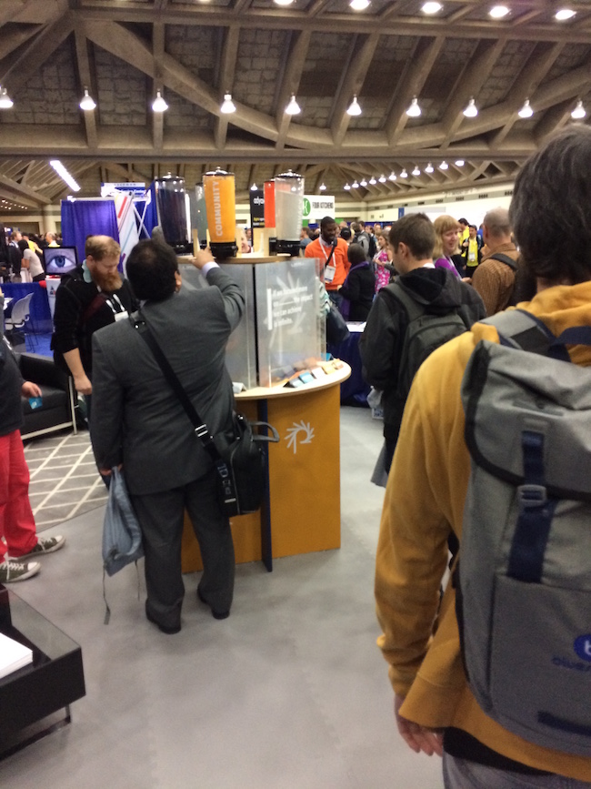 DrupalCon attendees vote on community issues in the Phase2 booth