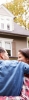 New homeowners outside their house