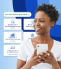Woman smiling while holding cellphone looking to the left